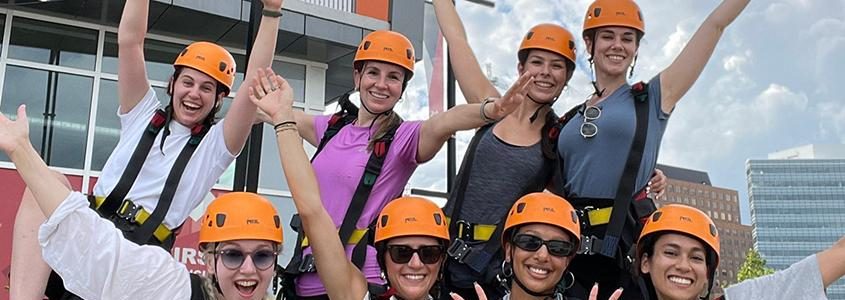 KPE's Safe Sport research lab taking a break from the ISSA conference in Ottawa to zip-line over the Ottawa river. Top Row: Raiya Taha Thomure, Ashley Stirling, Sarah McGee, Sophie Wensel; Bottom Row: Jatta Muhonen, Francesca Principe, Anika Taylor, Aalaya Milne